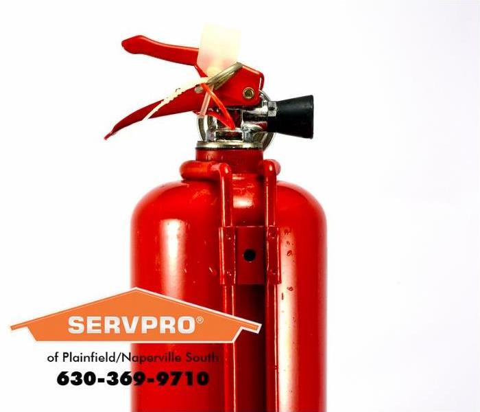 red fire extinguisher on a white background 